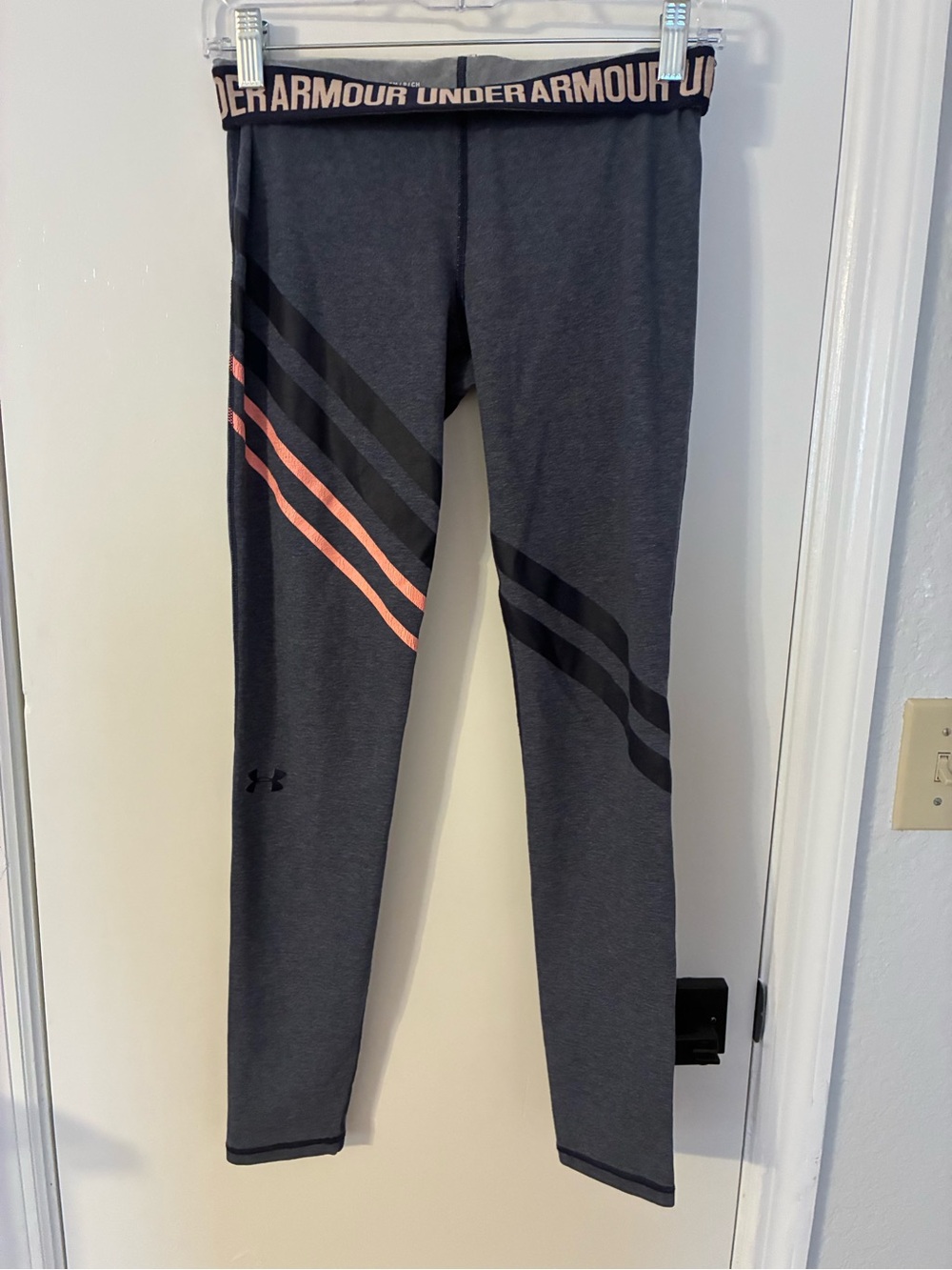 Under Armour Dark Gray Leggings with Coral and Black Accent Stripes